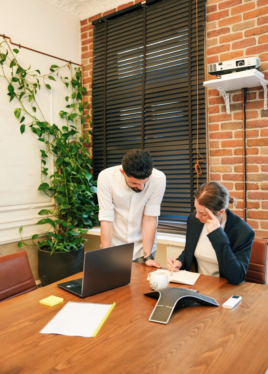 Colleagues Working in Eco-Friendly Office